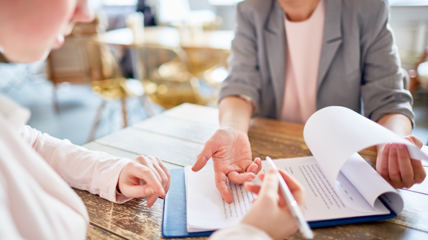 Multidisciplinary experts for long-term medical cost projection reviewing patient records, treatment plans, and future care expenses for accurate assessment.